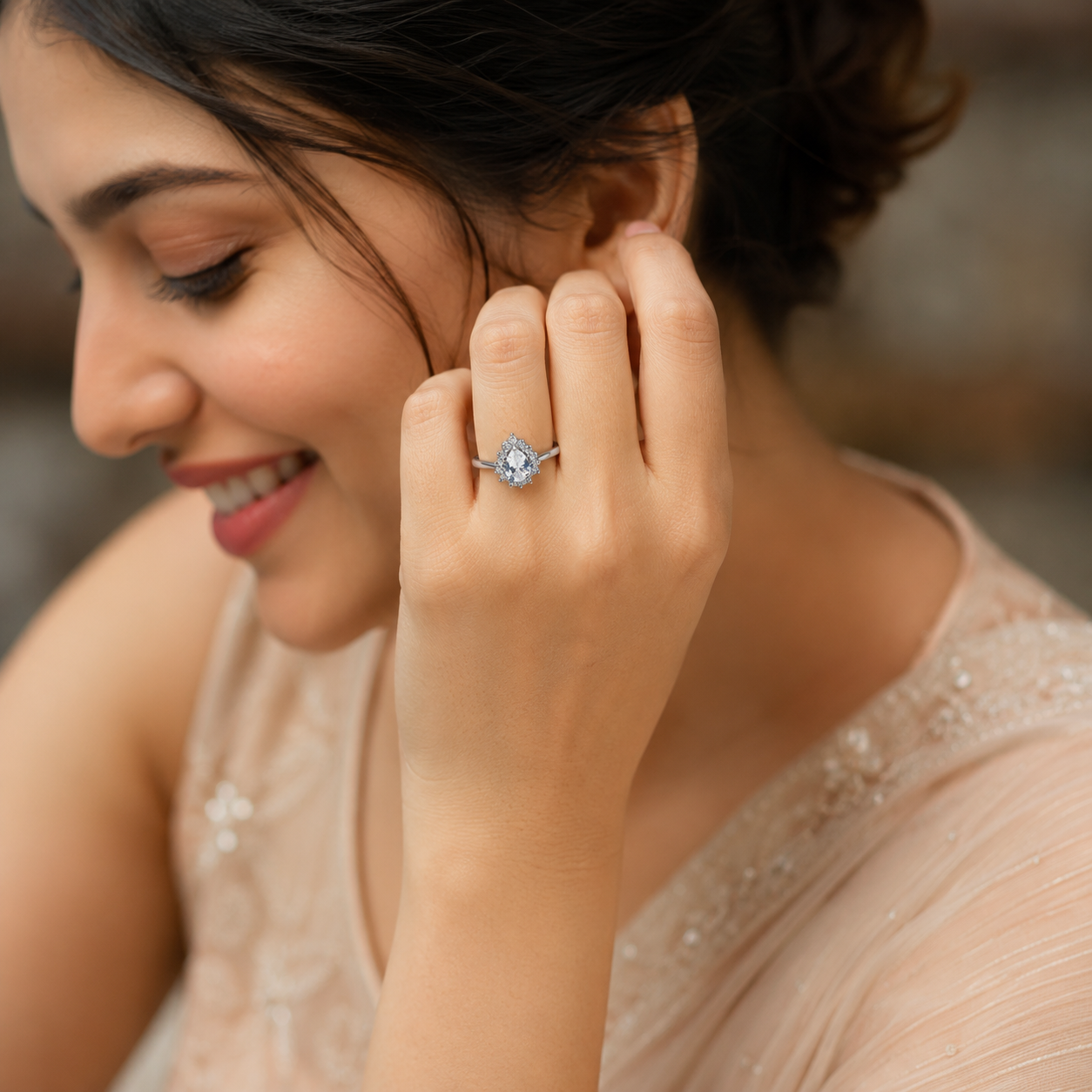 Silver Pear Cut Sunburst Halo Ring