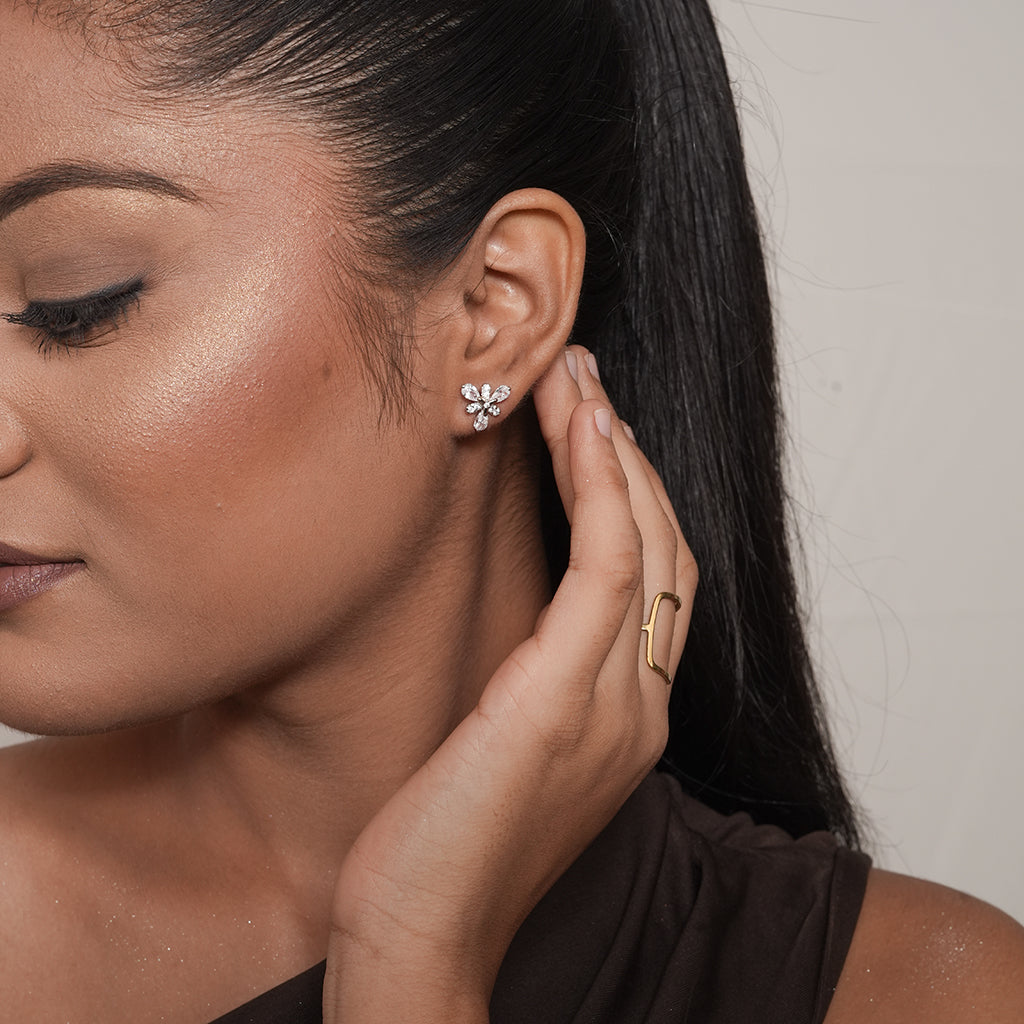 Close-up of Silver Pear CZ Flower Stud Earrings showing pear-shaped CZ stones arranged as floral petals