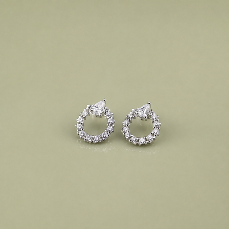 Front view of Silver Pear CZ Open Circle Stud Earrings with pear-shaped CZ accents and sparkling open-circle settings