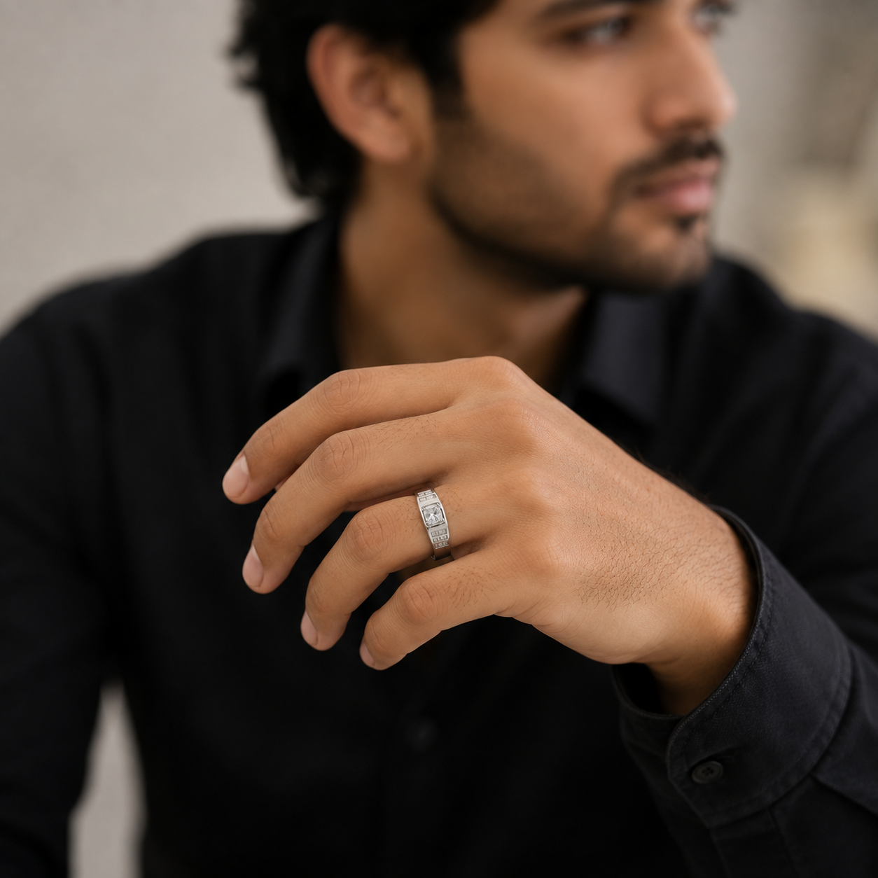 Round centre stone with channel set silver shoulders