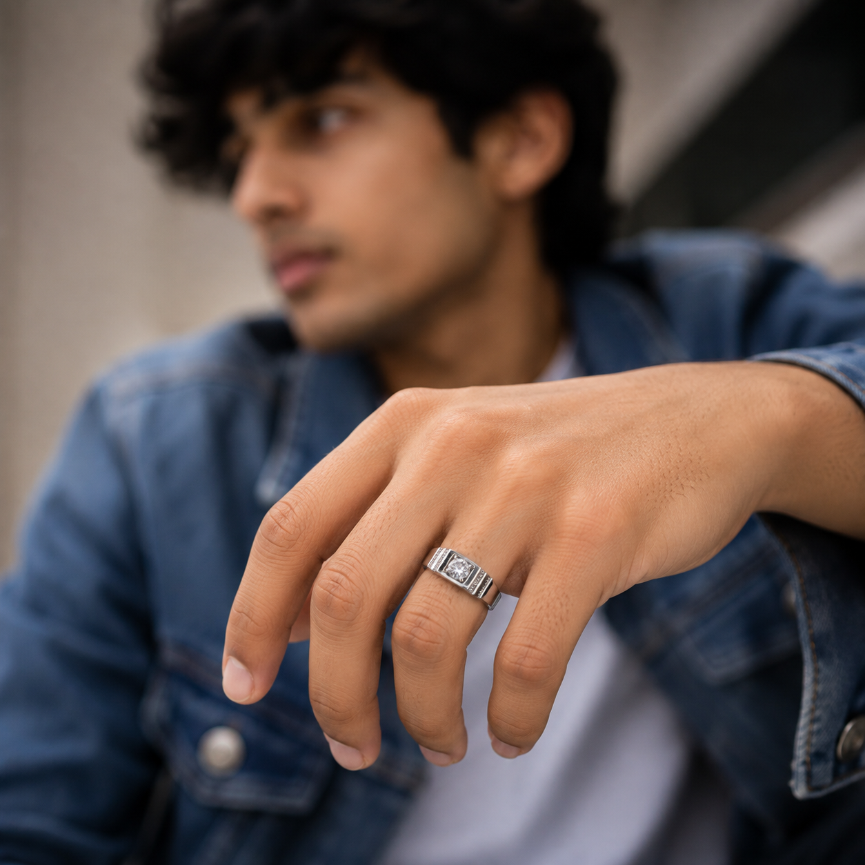 Single round CZ set into a silver square top ring