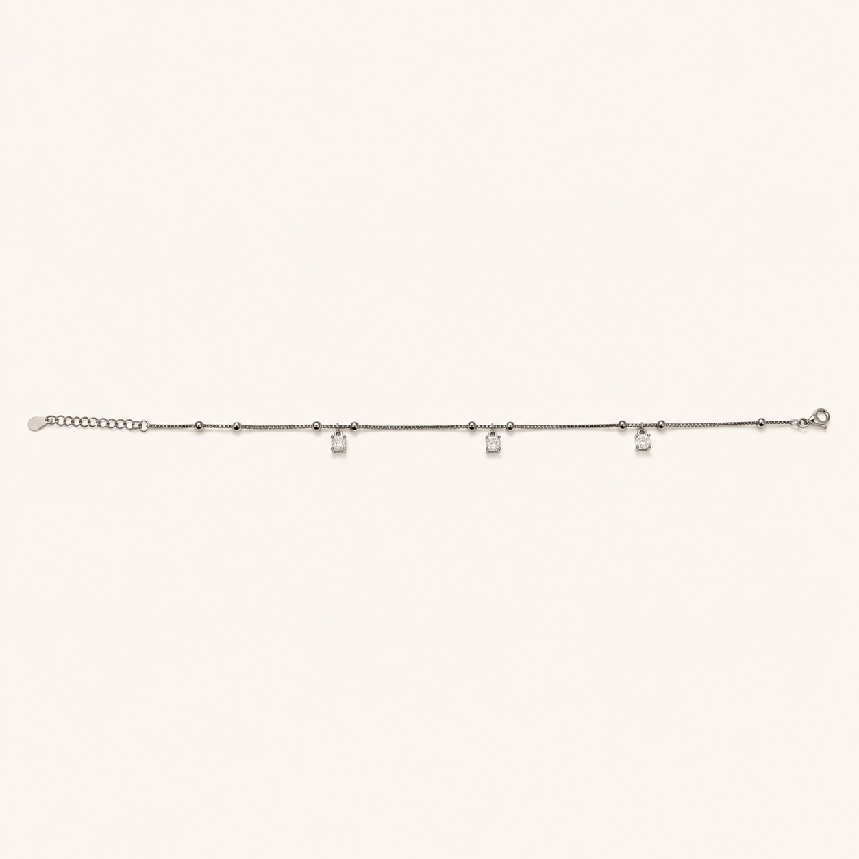 Silver CZ anklet with hanging square stone drops