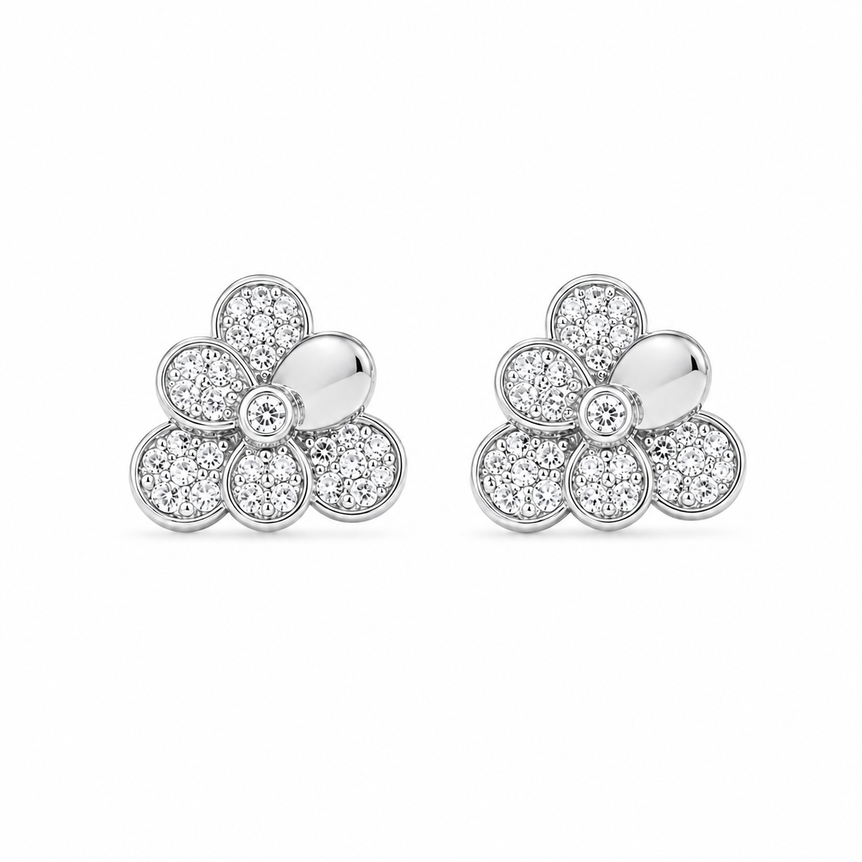 Close up of Sterling Silver Floral Cluster Stud Earrings with sparkling stones and one smooth petal against a white background
