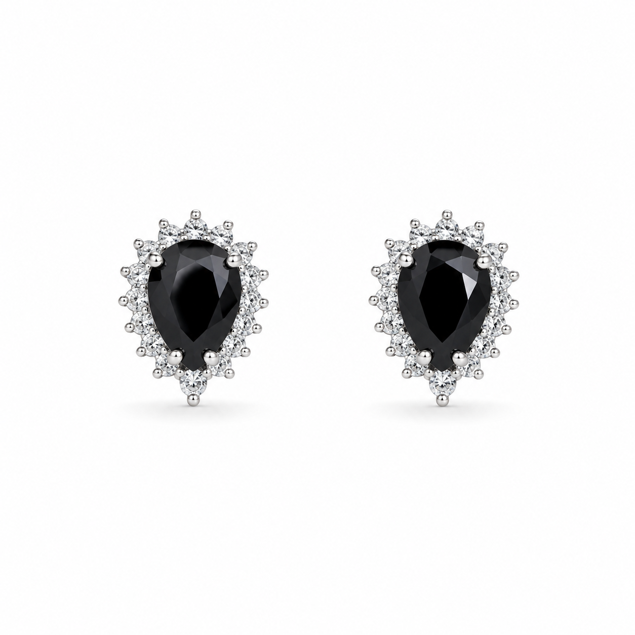 Close-up of a pair of Teardrop Black Stone Halo Silver Stud Earrings featuring a large black center stone surrounded by a halo of small clear crystals in a silver setting.